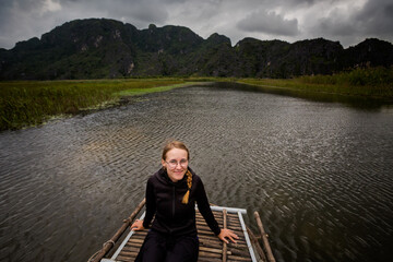 Fototapeta premium Tourist in Van Long in Tam Coc Vietnam