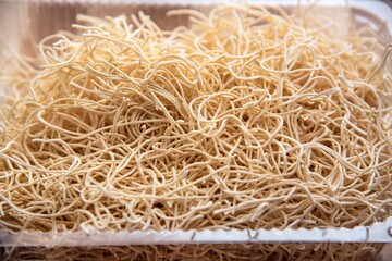 Homemade noodles from dough for soup. Close-up. Background. Texture.