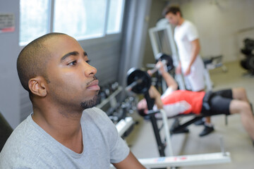 Fototapeta na wymiar tired man in the gym