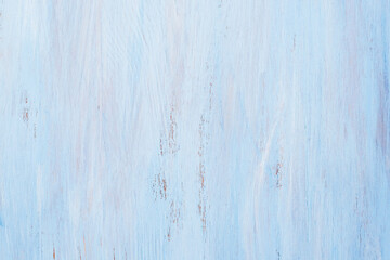 Obraz premium Subtle empty light blue wooden backdrop.