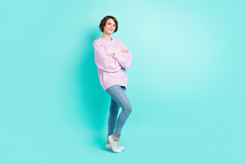 Fototapeta na wymiar Full length photo of charming pretty young lady dressed purple pullover standing arms folded isolated teal color background