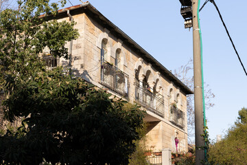 Evening  view of the quiet, green Hovevei Tsiyon Street in the old Jerusalem district Talbia - Komiyum in Jerusalem, Israel
