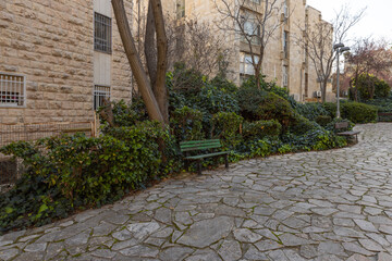Evening  view of a quiet residential street in the old district of Jerusalem Talbia - Komiyum in Jerusalem, Israel