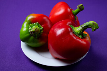 paprika on purple background