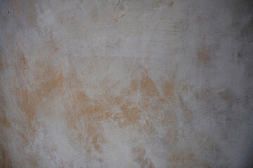 White and brown putty wall close-up. Construction exterior. Copy space
