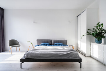 Fototapeta na wymiar Modern interior design in cozy and comfort bedroom