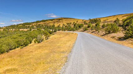 Sunny day over road on Mont Aigoual