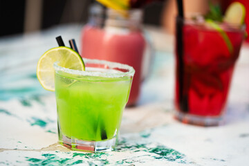 Exotic cocktails, fresh cold alcohol drinks at summer