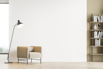 Light modern living room interior with panoramic window furnished by beige armchair, bookshelf and...
