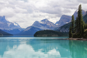 Fototapeta na wymiar Canada Alberta blue mountain lake on the background of the Rocky Mountains