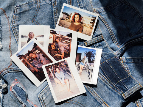 Polaroid photos of girl on the beach on denim shorts.