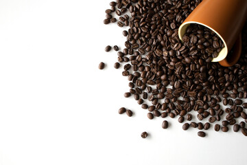 coffee bean in cup on white table background. top view. space for text. flat lay