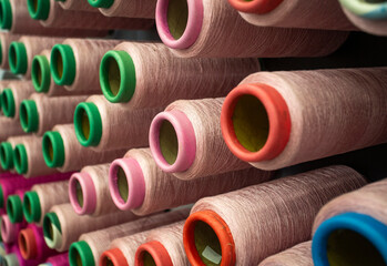 Variety of industrial sewing threads in the factory