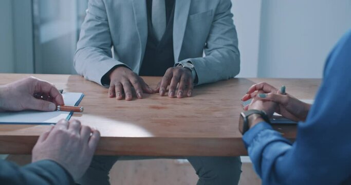 Multi-ethnic business people hands on a office desk