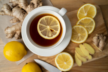 Fototapeta na wymiar Ginger tea with lemon. Season of colds and infections. Strengthening of immunity.