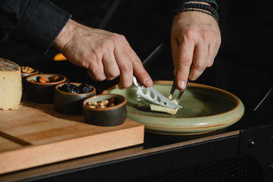 Preparing Beautiful Homemade French Cheese For Serving With Dry Fruits.