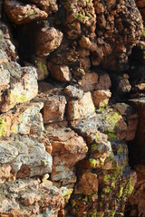 Weathered Rocks Background with Lichen Full Frame of Cliff 