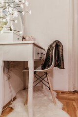 white chair and table in room