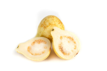 Couple Guava Fruits And Slices Isolated on White Background yellow guava fruit isolated on white background. Egyptian fruit. Couple Guava Fruits And Slices Isolated.