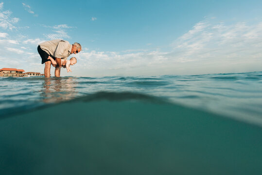 Grandpa plays with granddaughter