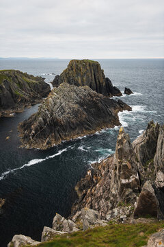 Landscape of cliffs and rocks with the sea in the background