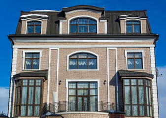 Fototapeta na wymiar Beautiful panel house with large windows and a nice balcony.