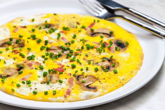 egg omelette with mushrooms and bacon