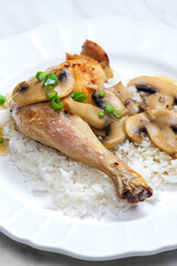 chicken leg with mushrooms and rice