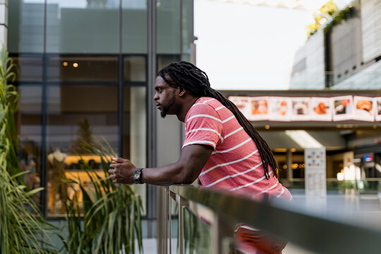 Pensive African american man in urban modern area