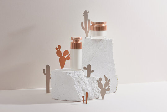 Face cream, elixir for beauty with cactus made from paper. Minimalism