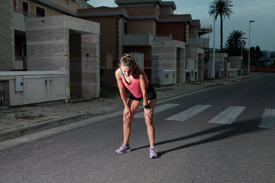 Portrait of a young woman runner