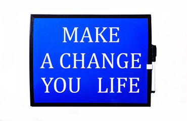 On a blue background a white inscription MAKE A CHANGE YOUR LIFE
