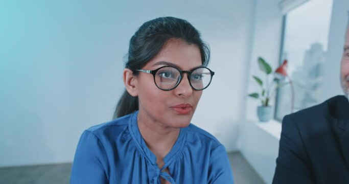Indian businesswoman speaking in a meeting 