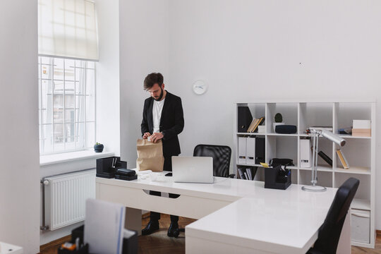 Man ordering dishes from delivery services