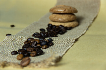 macarons with coffee flavor and coffee beans .