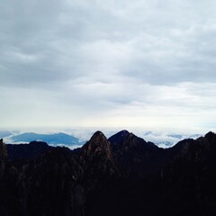 China Mount HuangShan - April, 2015: Natural scenery, sunsets, peculiarly-shaped granite peaks, Huangshan pine trees and views of the clouds from above. Photo taken in Yellow Mountain (UNESCO).