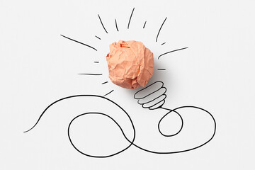 Crumpled paper light bulb as a good idea.