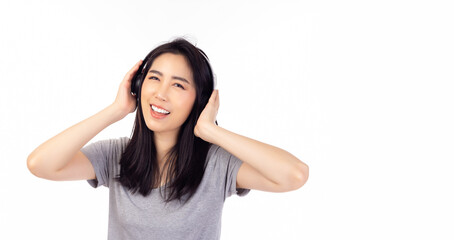 Young asian trendy woman listening music in headphones and singing song with isolated on white background Pretty girl get happy and relax She enjoy nice music Isolated on white background Copy space