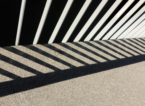shadow of railing on street