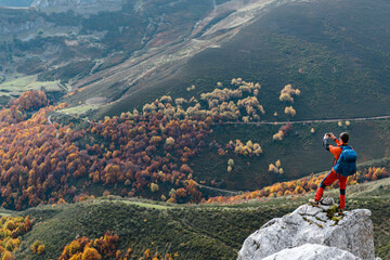 Unrecognizable hiker shooting with phone fall highlands