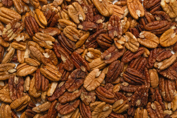 Tasty pecan-nut background. Top view.