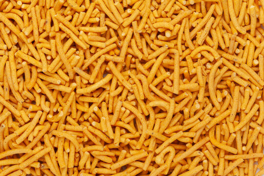 Close-up of Marwadi Bhujiya Indian namkeen (snacks)  Full-Frame Background. Top View