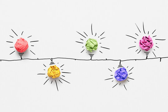 Paper crumpled bulbs on a drawn garland.