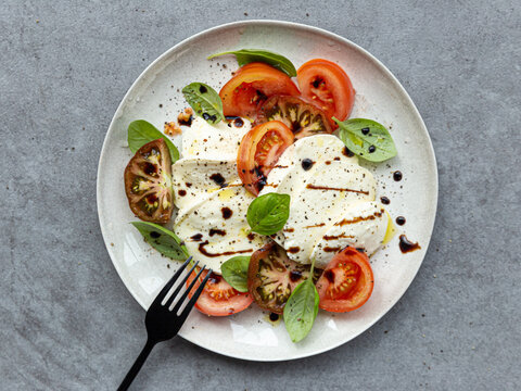 Tomato, basil and mozzarella salad with balsamic reduction