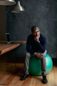 Portrait of a young Indian Phd professor