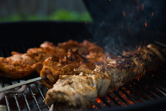 Delicious chicken kebabs on a charcoal grill