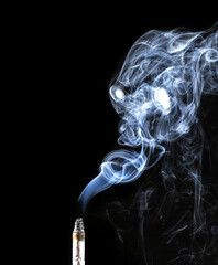 Demon made of cigarette smoke. Smoke art.