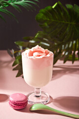 Glass of strawberry iced Dalgona whipped drink coffee