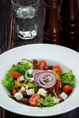 Greek salad on a white plate