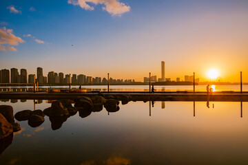 sunset over the city or lake